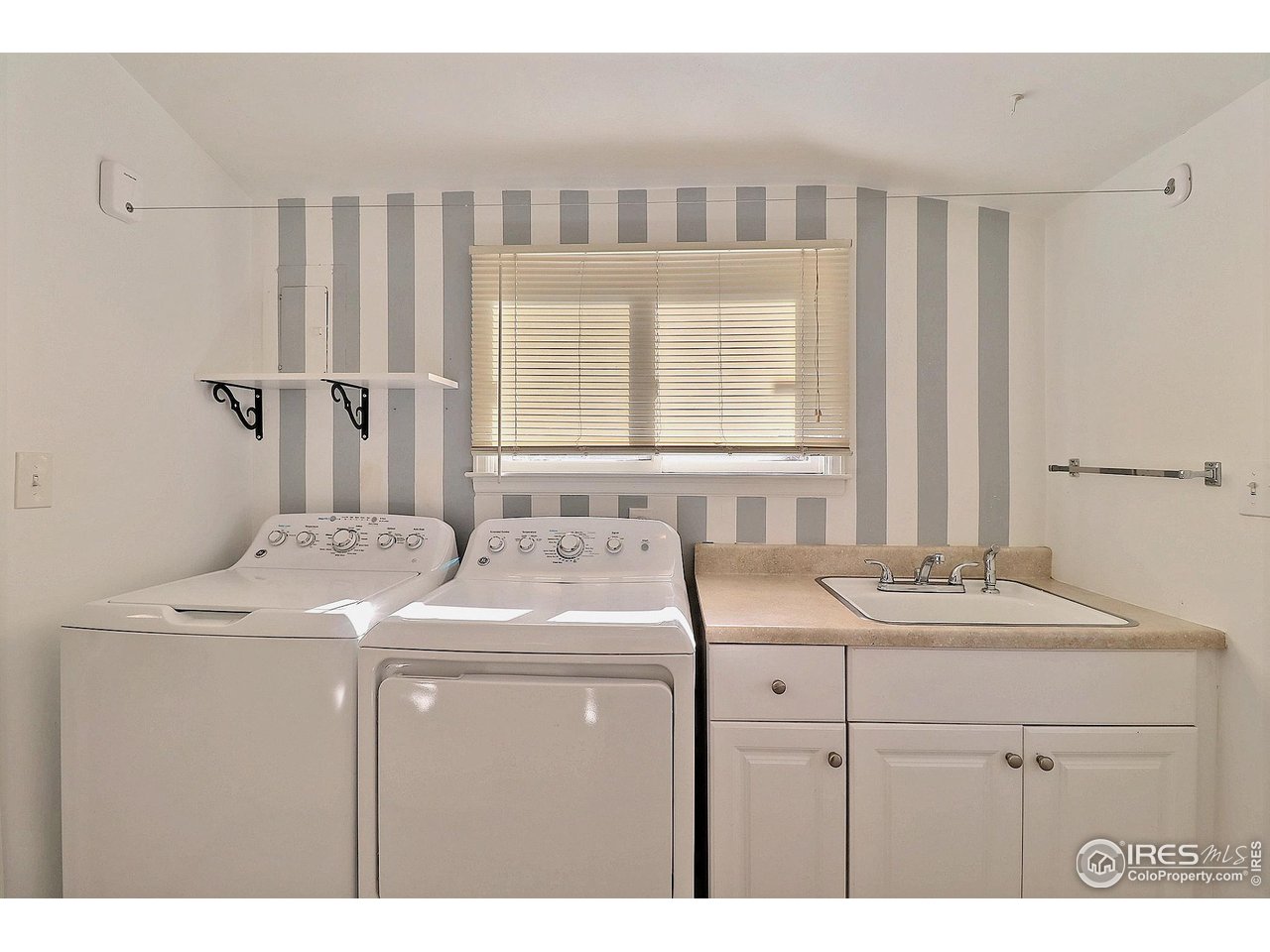 1307 12th Avenue Greeley, CO 80631 - Photo 15 of 36 Main Floor Laundry with Sink