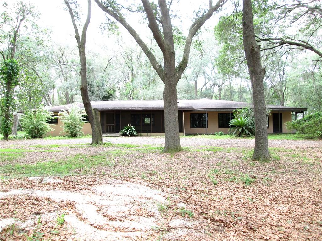5322 Miley Road Plant City, FL 33565 - Photo 1 of 1 NESTLED UNDER CANOPY OF OAKS