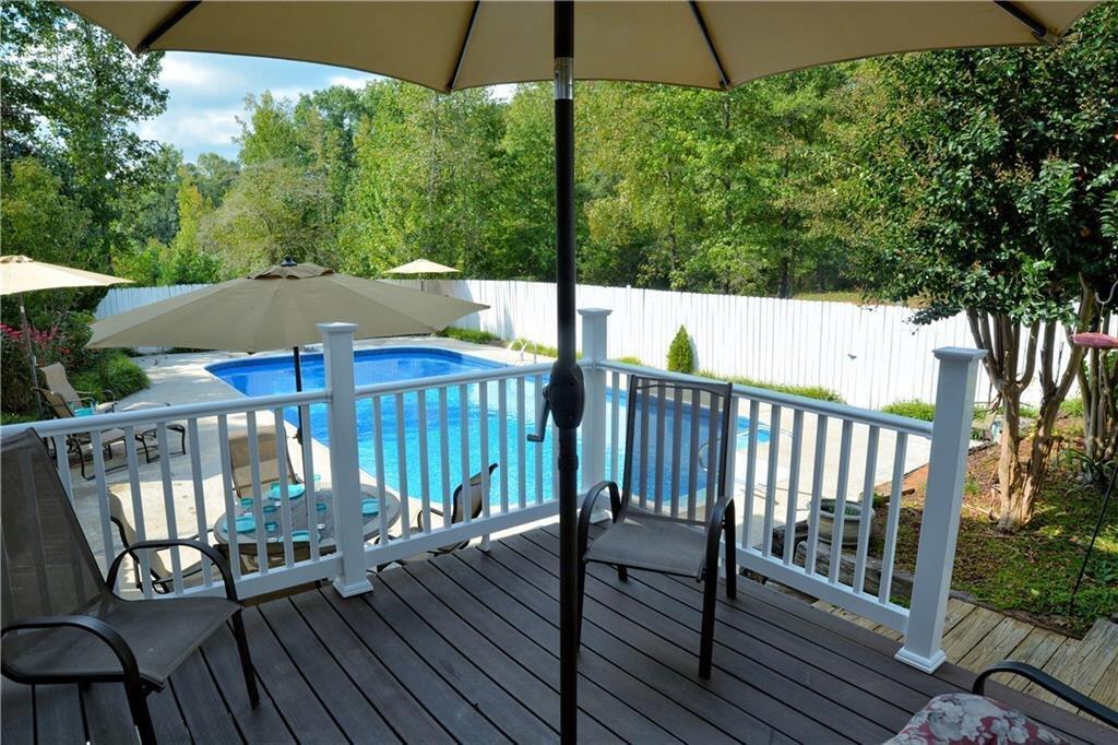 301 Spruill Bridge Road Temple, GA 30179 - Photo 12 of 73 a view of a balcony with wooden floor