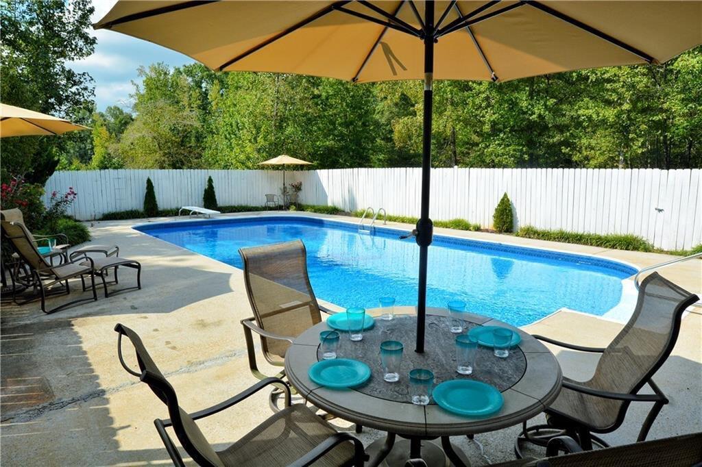 301 Spruill Bridge Road Temple, GA 30179 - Photo 13 of 73 a view of an outdoor sitting area with furniture