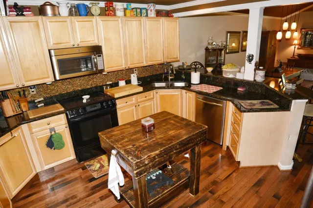 a view of a lake with trees