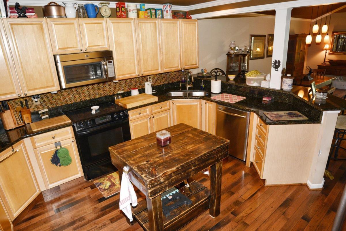 301 Spruill Bridge Road Temple, GA 30179 - Photo 47 of 73 a kitchen with a stove and a microwave