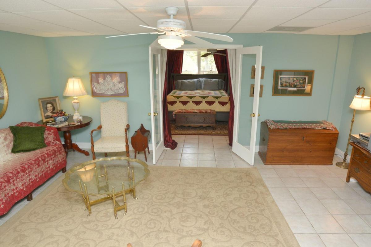 301 Spruill Bridge Road Temple, GA 30179 - Photo 62 of 73 a living room with furniture and a lamp