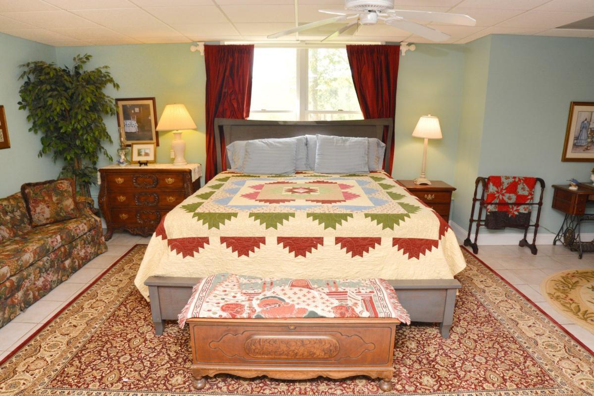 301 Spruill Bridge Road Temple, GA 30179 - Photo 66 of 73 a bed sitting in a bedroom next to a window with outer view