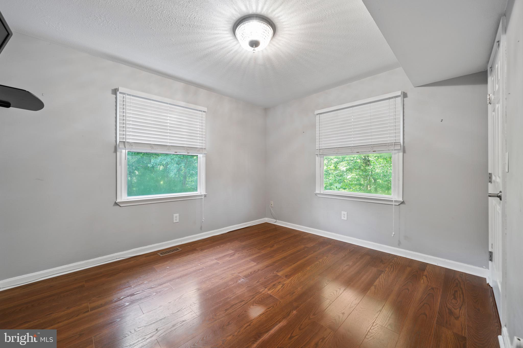 12573 Gun Road Lusby, MD 20657 - Photo 22 of 34 an empty room with a window
