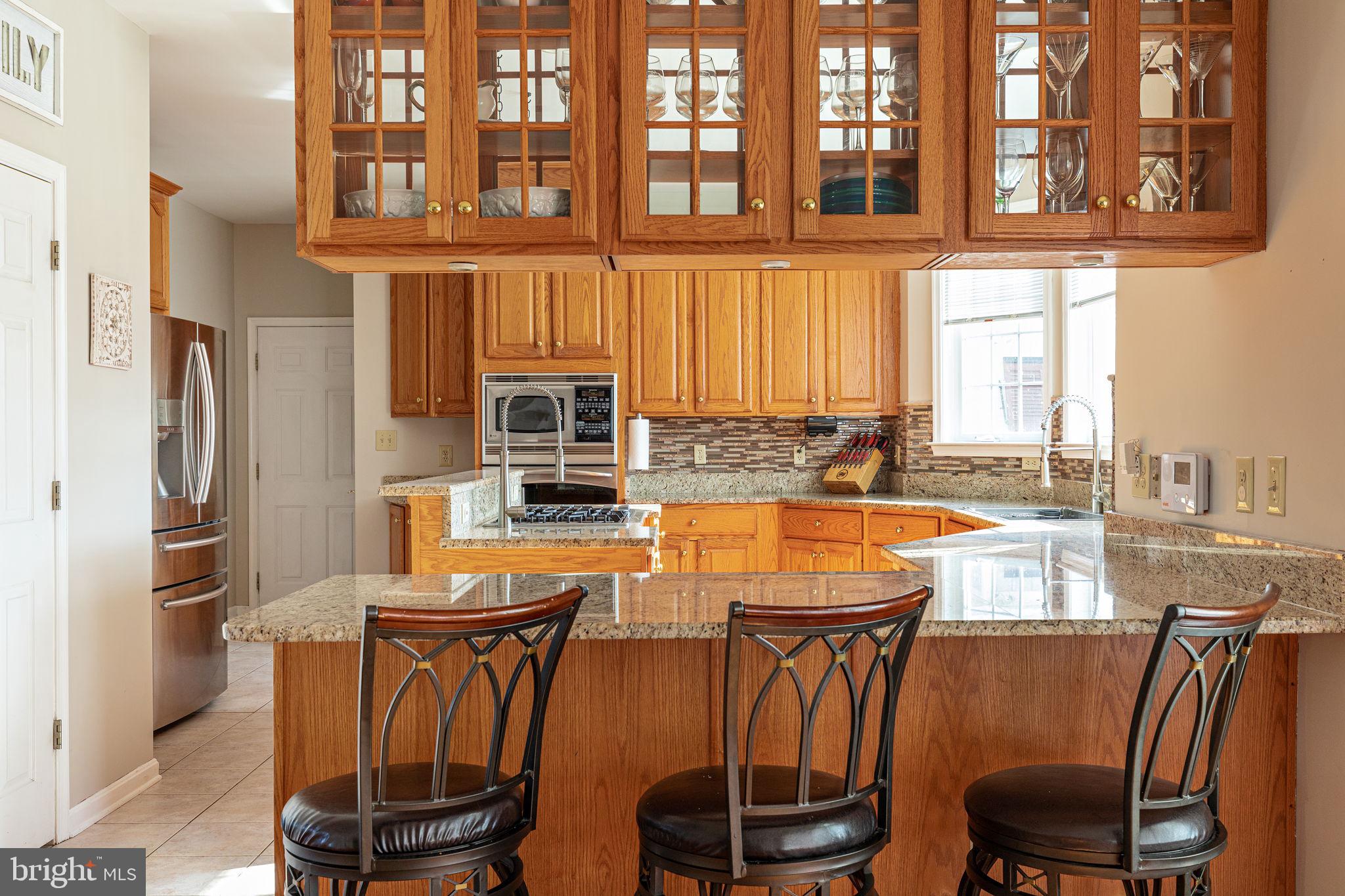 281 Huntersridge Road Winchester, VA 22602 - Photo 15 of 50 Kitchen bar seating area