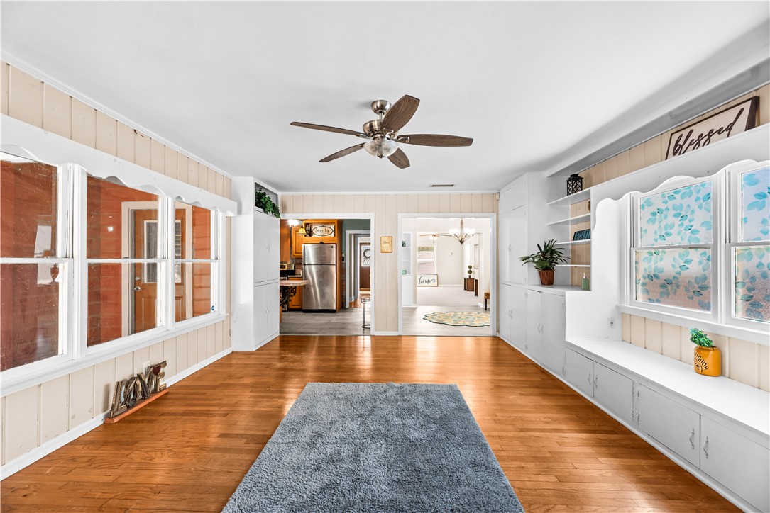 714 Indiana Avenue Corpus Christi, TX 78404 - Photo 18 of 38 a living room with stainless steel appliances furniture a rug and a large window