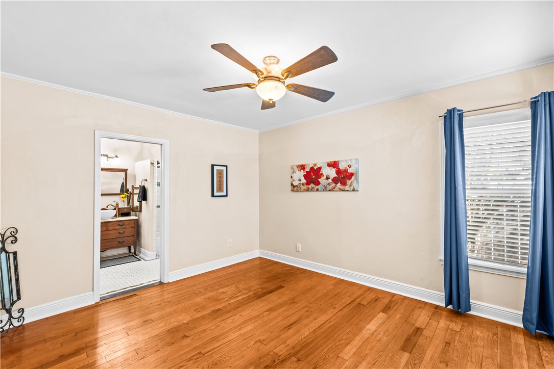 714 Indiana Avenue Corpus Christi, TX 78404 - Photo 27 of 38 a view of a big room with wooden floor and windows