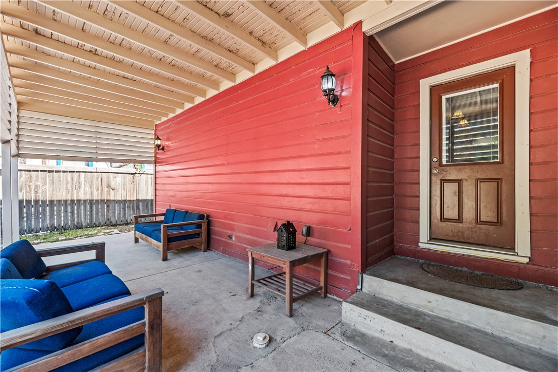 714 Indiana Avenue Corpus Christi, TX 78404 - Photo 32 of 38 a backyard of a house with outdoor seating