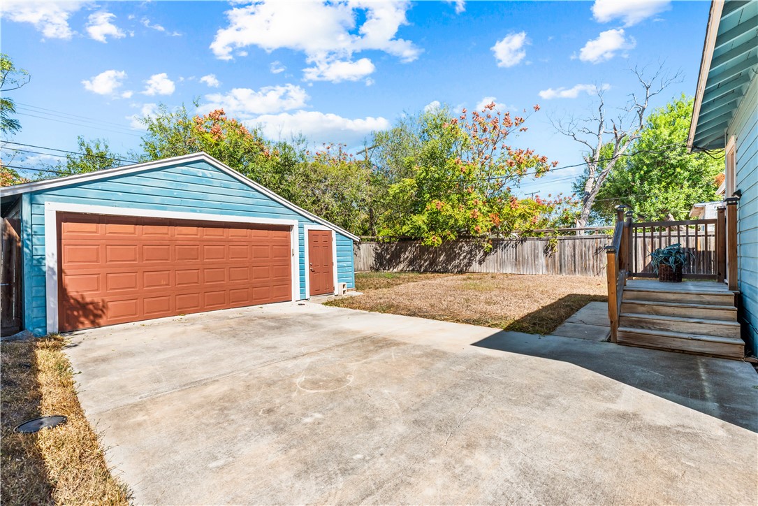 714 Indiana Avenue Corpus Christi, TX 78404 - Photo 35 of 38 a front view of a house with a yard and garage