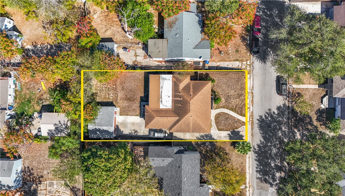 714 Indiana Avenue Corpus Christi, TX 78404 - Photo 5 of 38 an aerial view of a house with large trees
