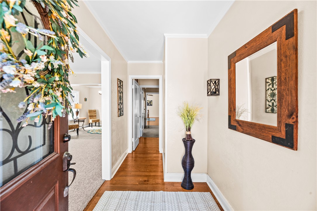 714 Indiana Avenue Corpus Christi, TX 78404 - Photo 6 of 38 a hallway with wooden floor stairs and furniture