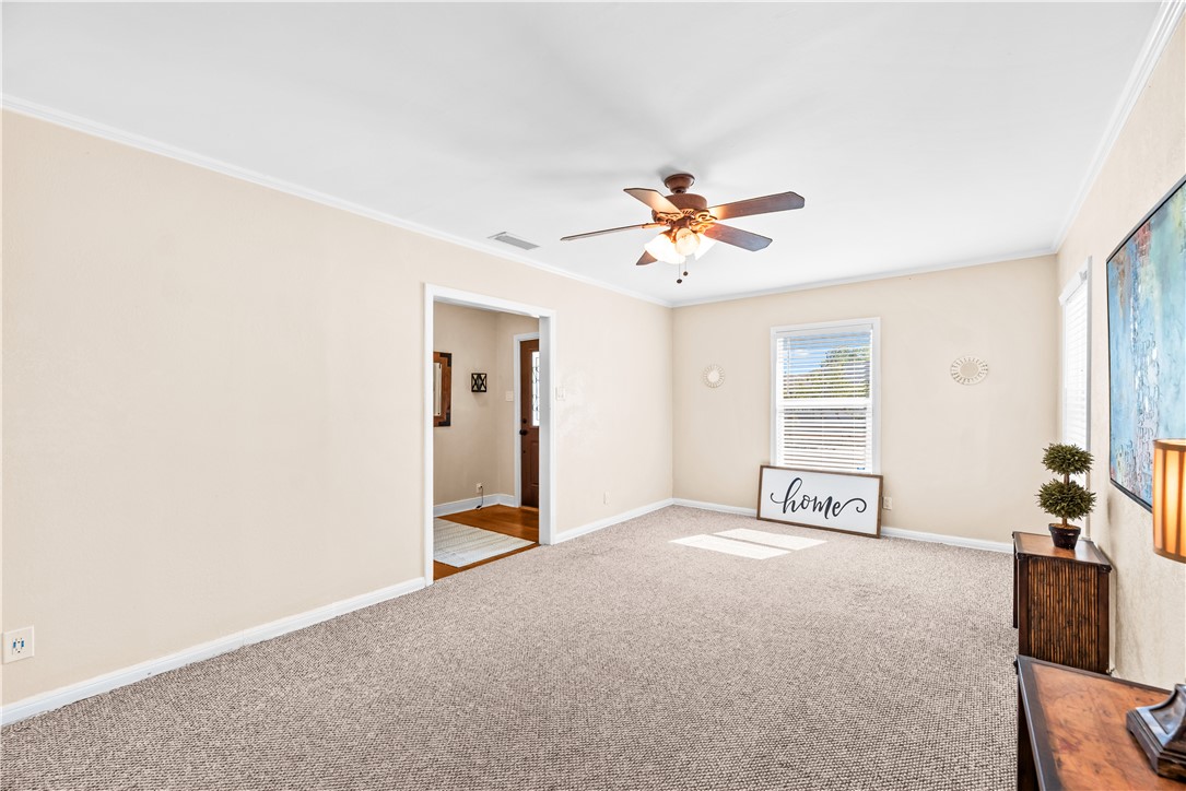 714 Indiana Avenue Corpus Christi, TX 78404 - Photo 8 of 38 a view of an empty room with window
