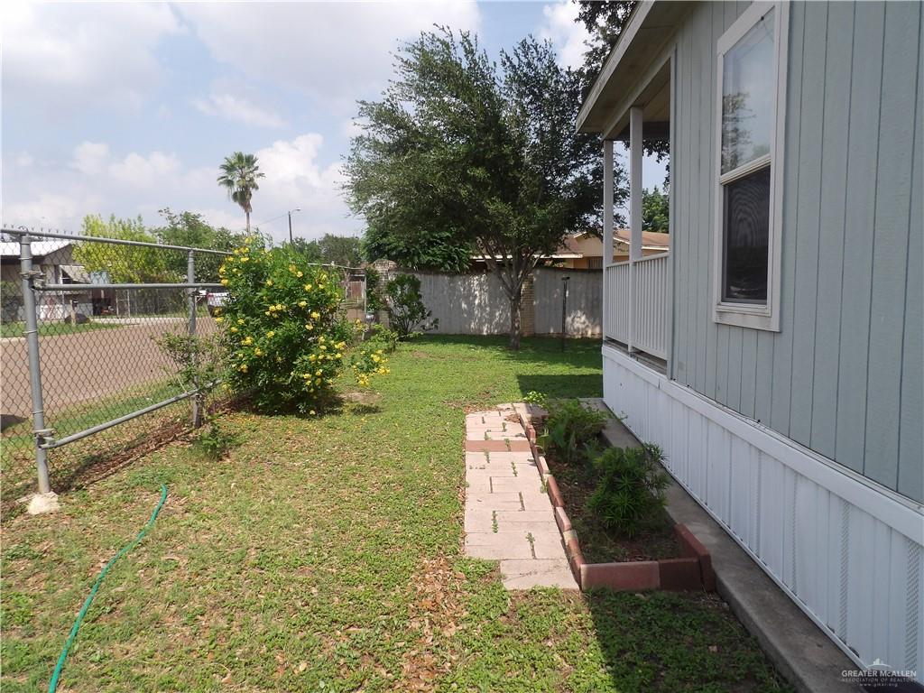 1406 West Ray Circle Mission, TX 78572 - Photo 18 of 22 a view of a backyard with pathway