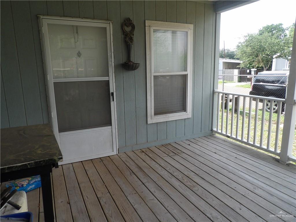 1406 West Ray Circle Mission, TX 78572 - Photo 20 of 22 a view of backyard with deck and wooden floor