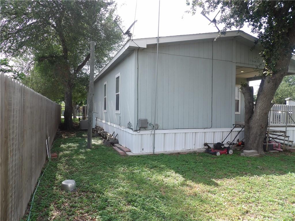 1406 West Ray Circle Mission, TX 78572 - Photo 21 of 22 a view of backyard with tub and trees