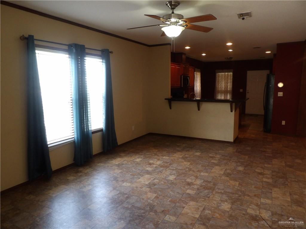 1406 West Ray Circle Mission, TX 78572 - Photo 7 of 22 a view of an empty room with a window
