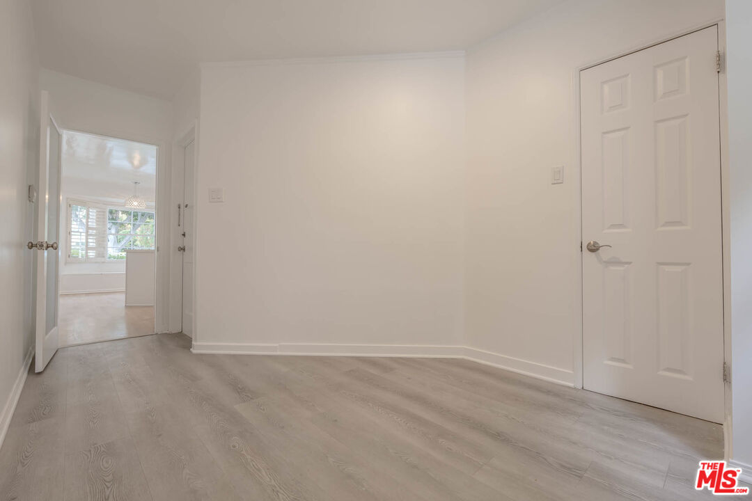 1216 Peck Drive Los Angeles, CA 90035 - Photo 13 of 29 wooden floor and window in an empty room