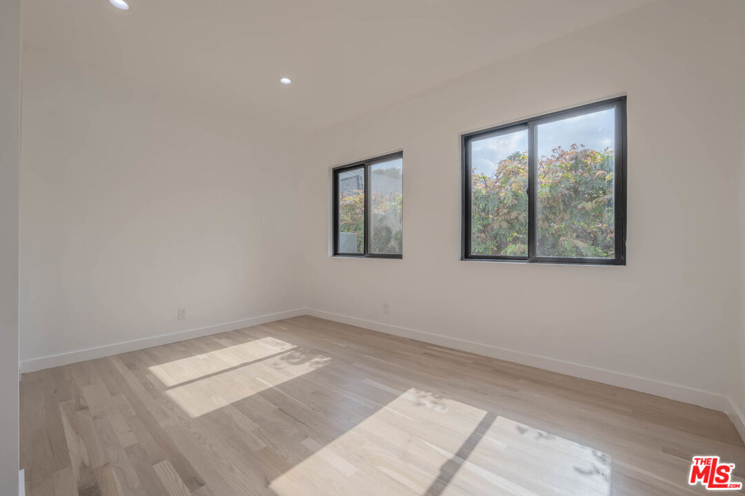 1216 Peck Drive Los Angeles, CA 90035 - Photo 18 of 29 a view of an empty room with a window