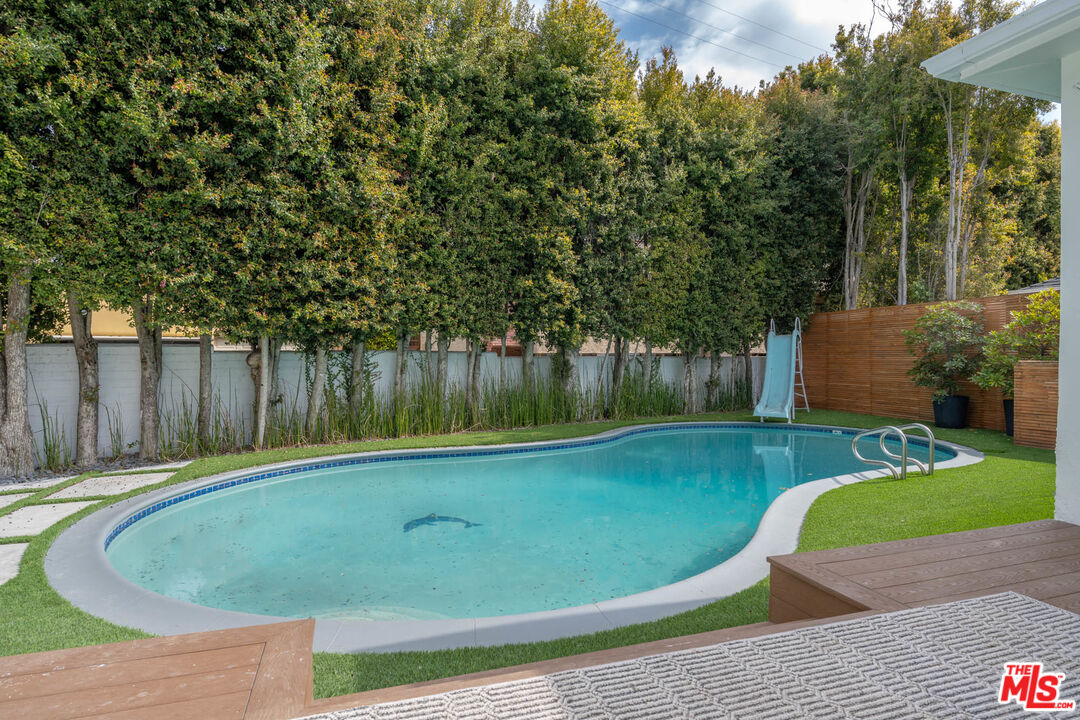 1216 Peck Drive Los Angeles, CA 90035 - Photo 27 of 29 a view of a backyard with swimming pool