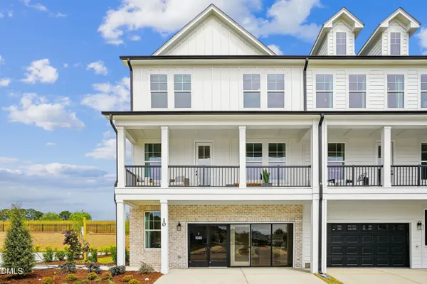 a front view of a house with a balcony