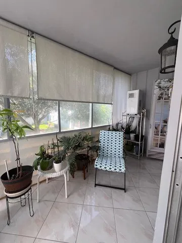 a kitchen with a sink and a stove top oven