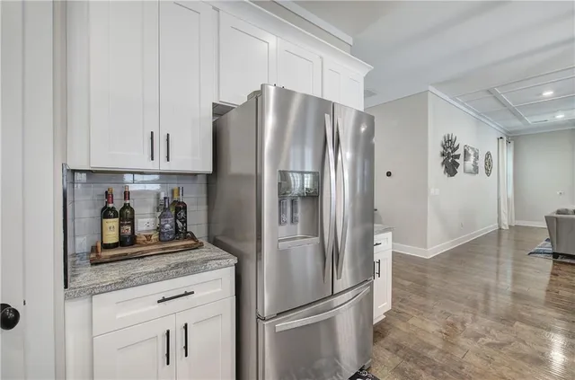 a bathroom with a double vanity sink and mirror