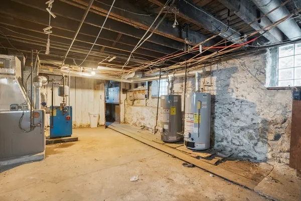 a view of empty room with wooden walls