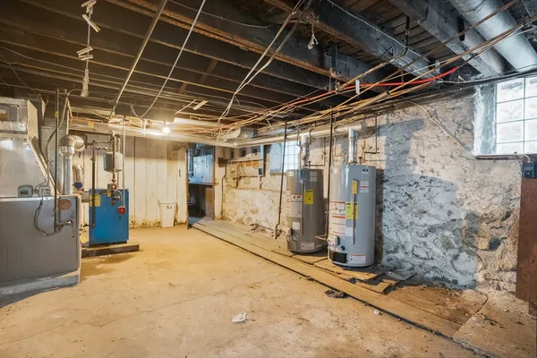 a view of empty room with wooden walls