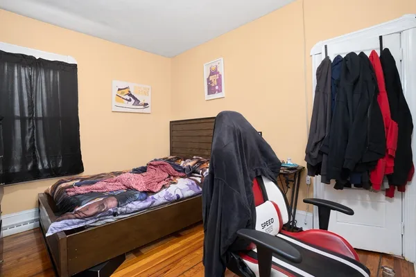 a bed room with a bed and a walk in closet