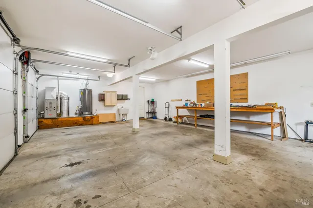 a view of bathroom with a tub shower and sink