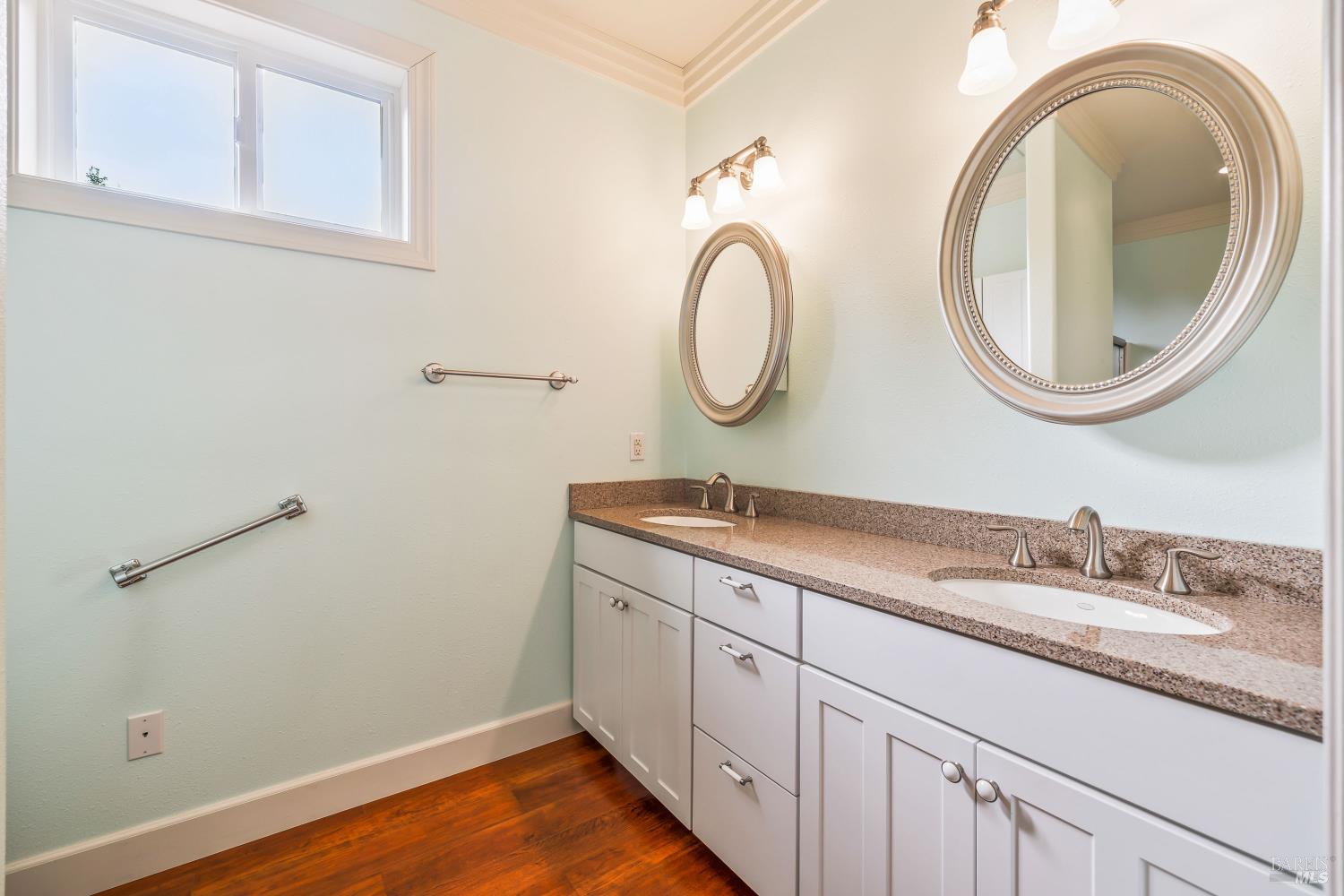 16611 Pearl Ranch Road Fort Bragg, CA 95437 - Photo 43 of 71 a bathroom with a granite countertop double vanity sink and a mirror