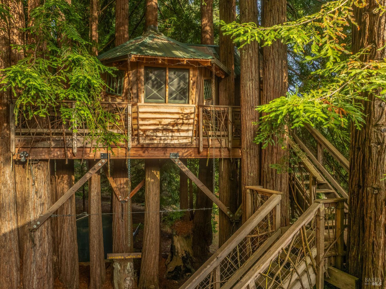 16611 Pearl Ranch Road Fort Bragg, CA 95437 - Photo 48 of 71 a view of balcony with wooden fence and potted plants