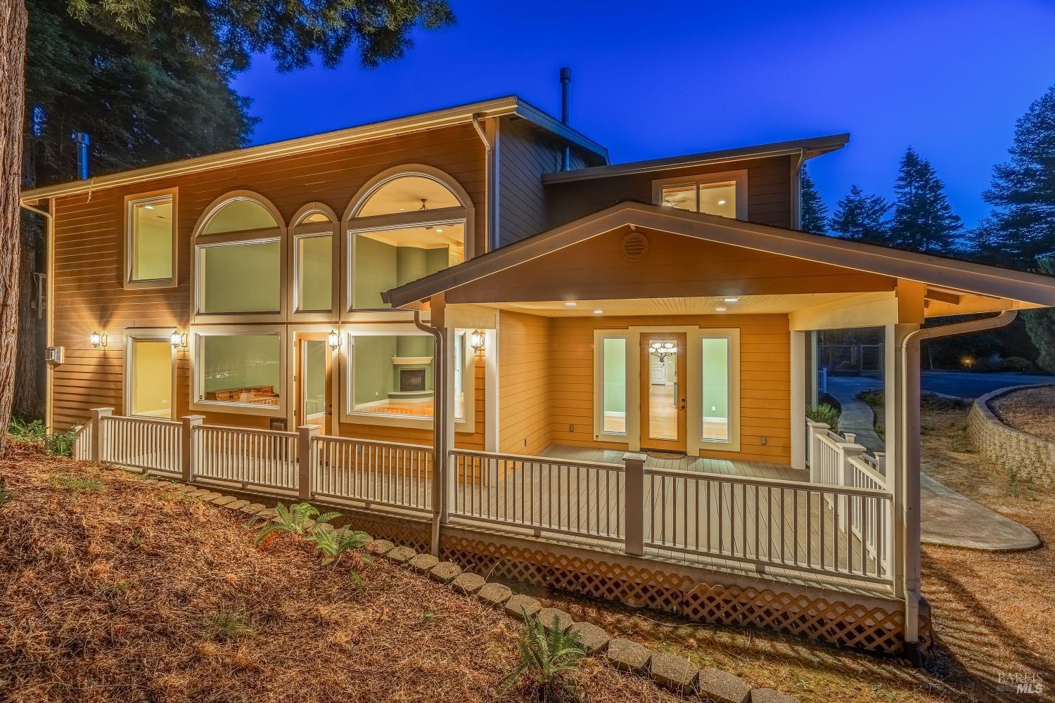 16611 Pearl Ranch Road Fort Bragg, CA 95437 - Photo 63 of 71 a front view of a house with a yard