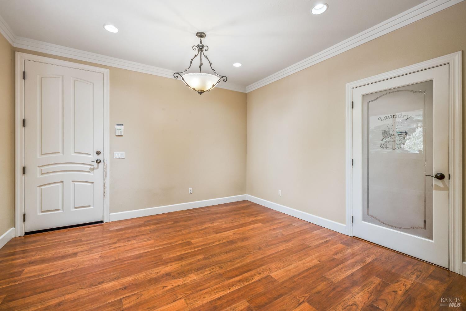 16611 Pearl Ranch Road Fort Bragg, CA 95437 - Photo 10 of 71 a view of empty room with wooden floor and ceiling fan