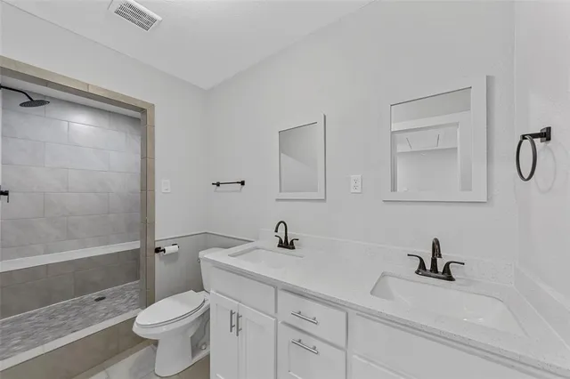 an empty room with a empty space and windows