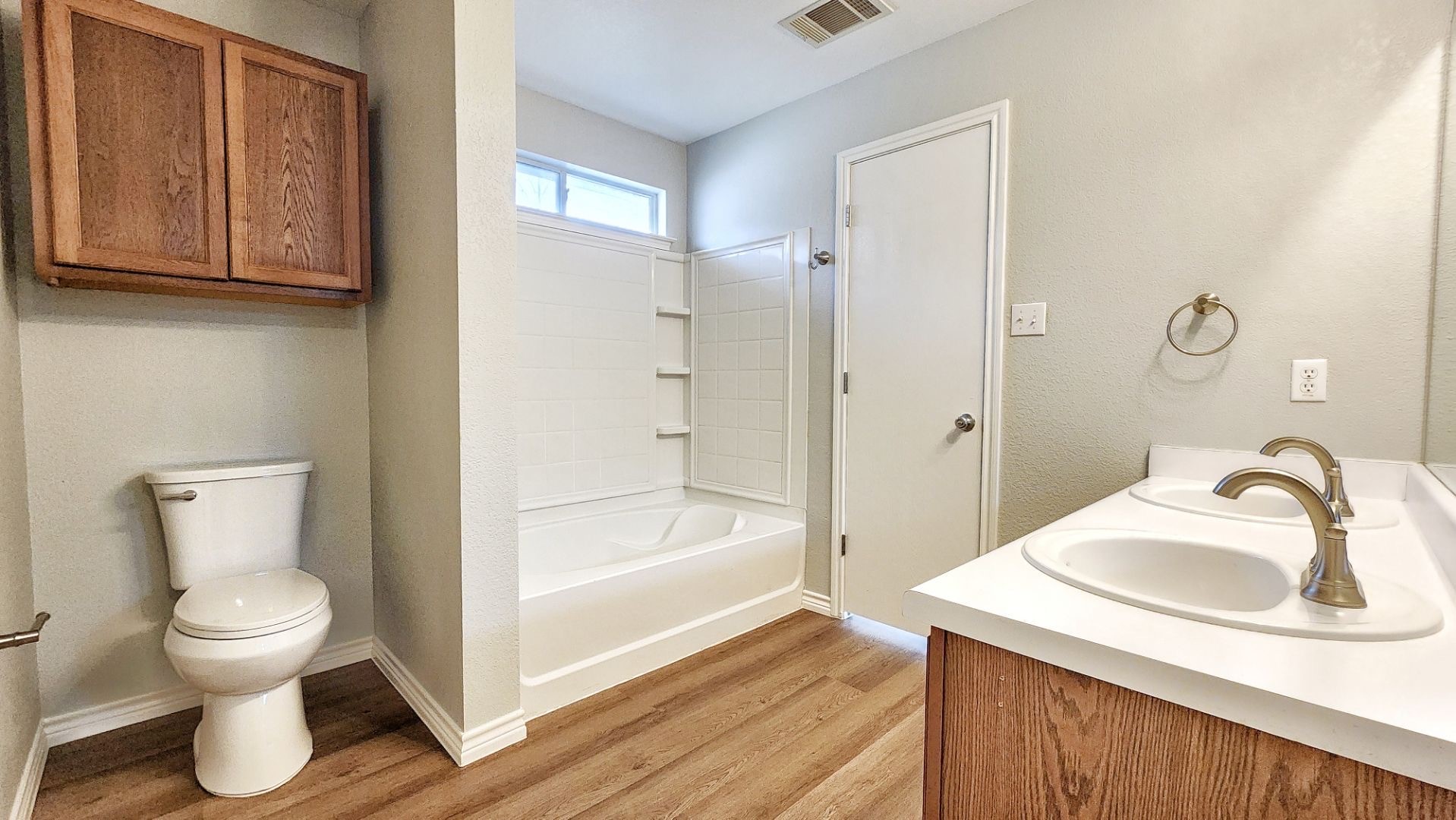 202 Brandons Way Buda, TX 78610 - Photo 11 of 16 a bathroom with a sink toilet and shower