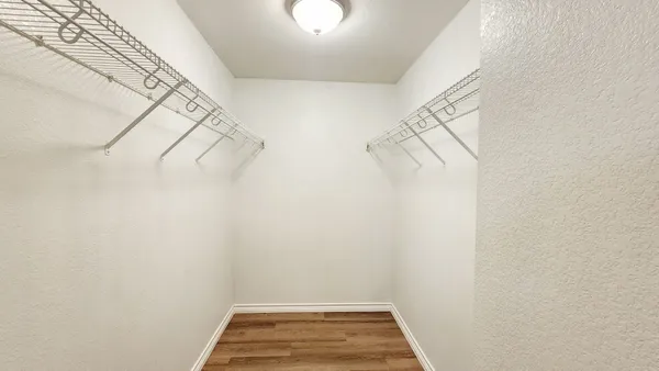 a view of a room with racks on the wall
