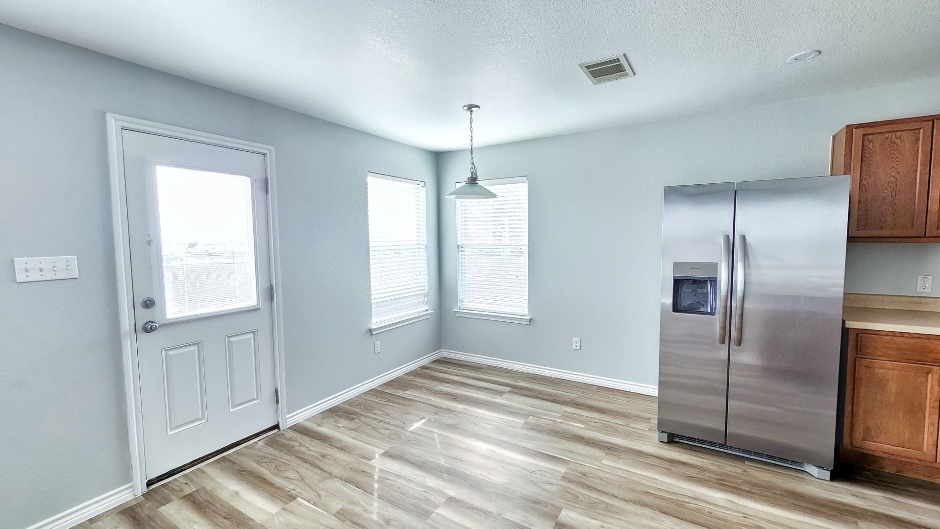 202 Brandons Way Buda, TX 78610 - Photo 5 of 16 a view of a kitchen with a sink and cabinet area