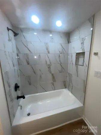 a bathroom with a bathtub