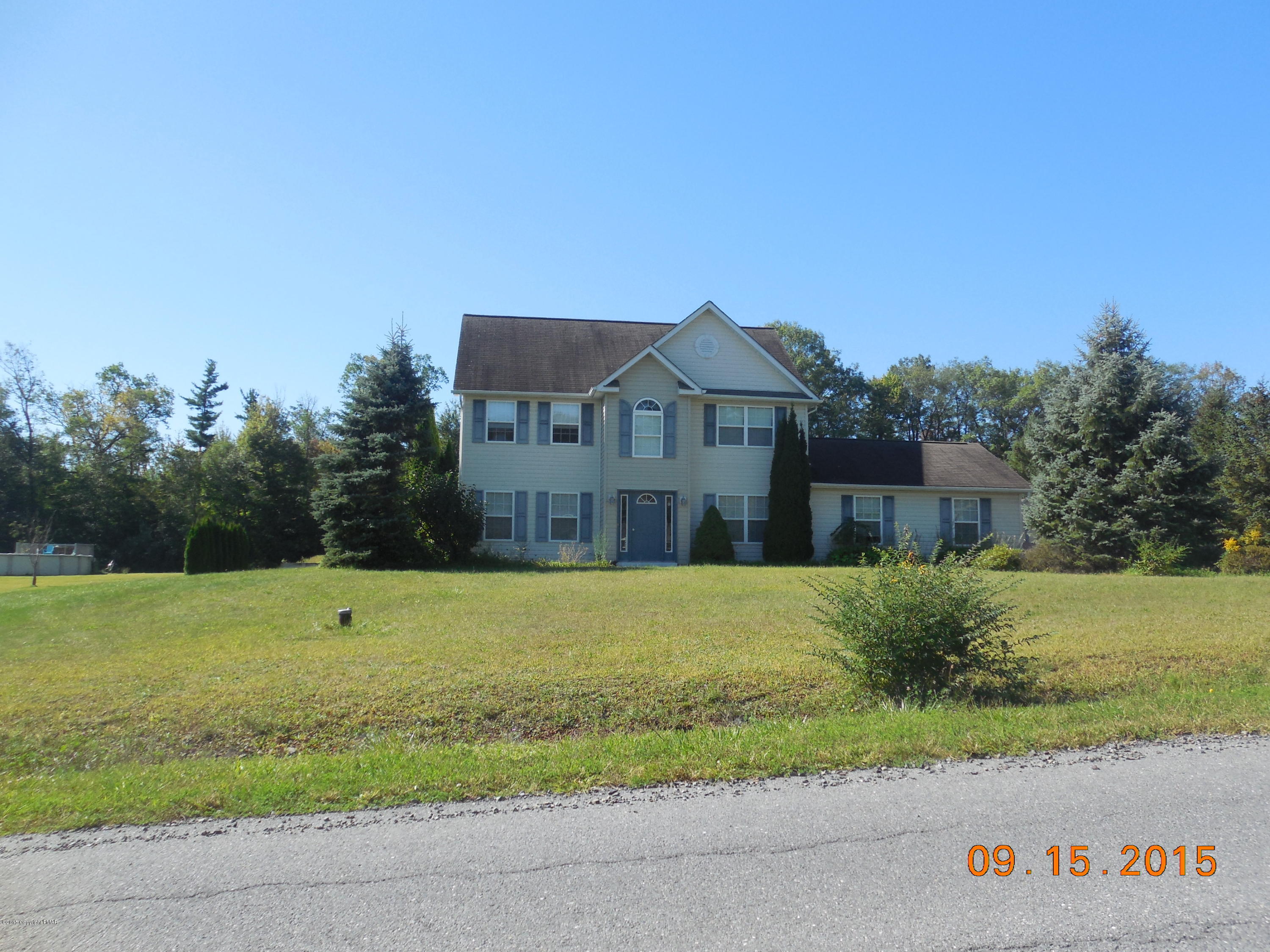2216 Hill Road Effort, PA 18330 - Photo 1 of 11 a house with trees in the background