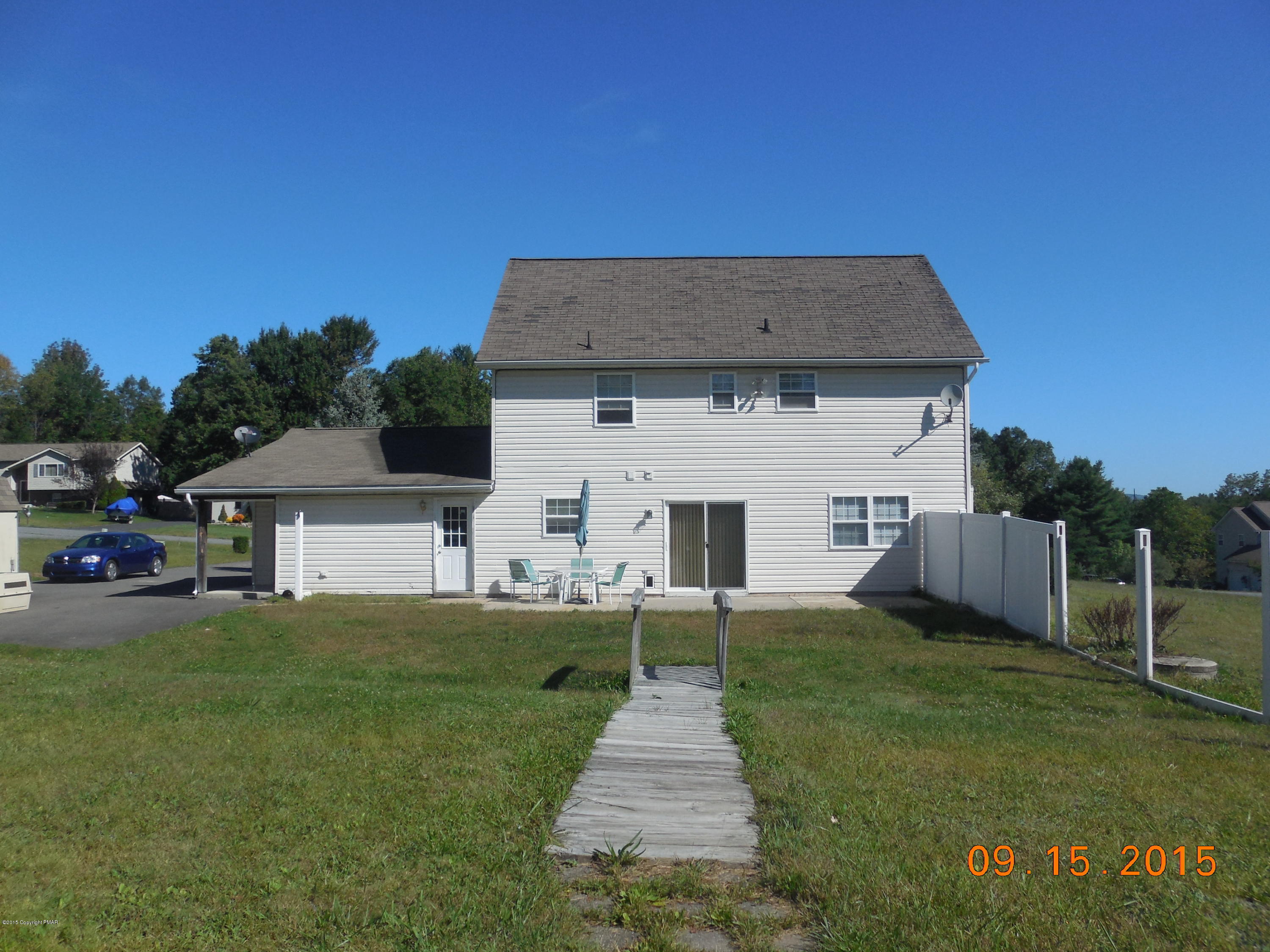 2216 Hill Road Effort, PA 18330 - Photo 11 of 11 a front view of a house with a yard