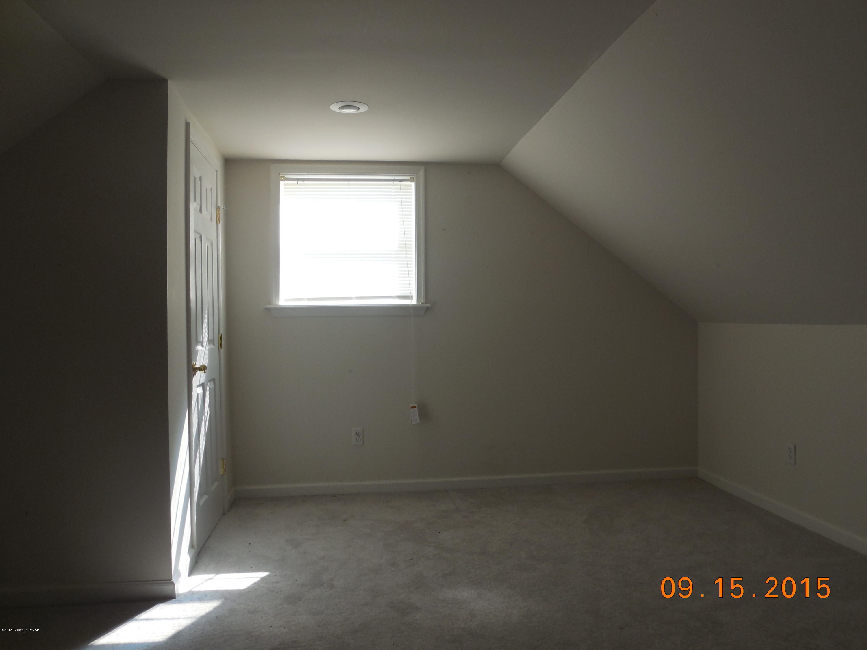 2216 Hill Road Effort, PA 18330 - Photo 8 of 11 an empty room with a window