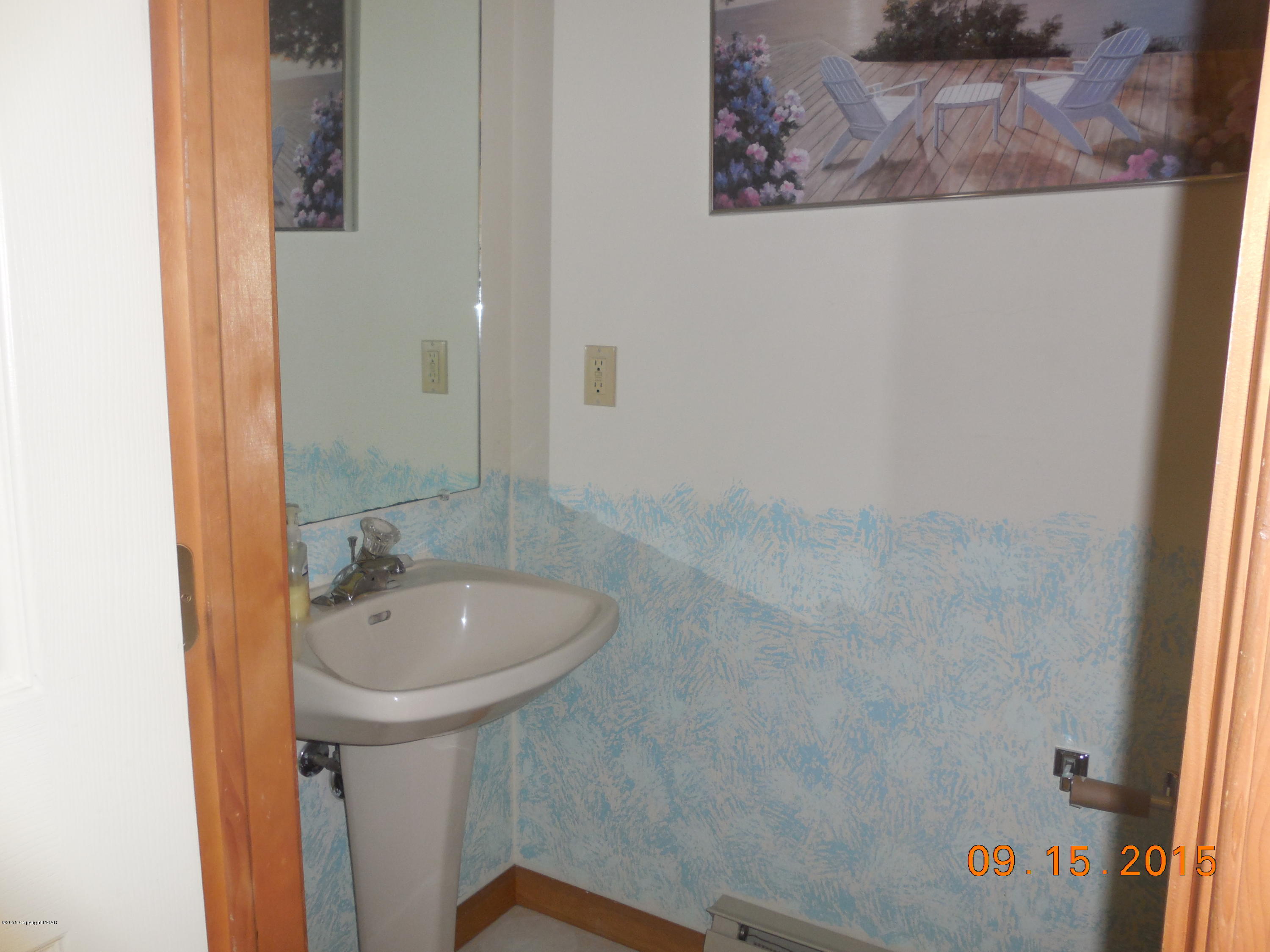 2216 Hill Road Effort, PA 18330 - Photo 10 of 11 a bathroom with a sink and a mirror