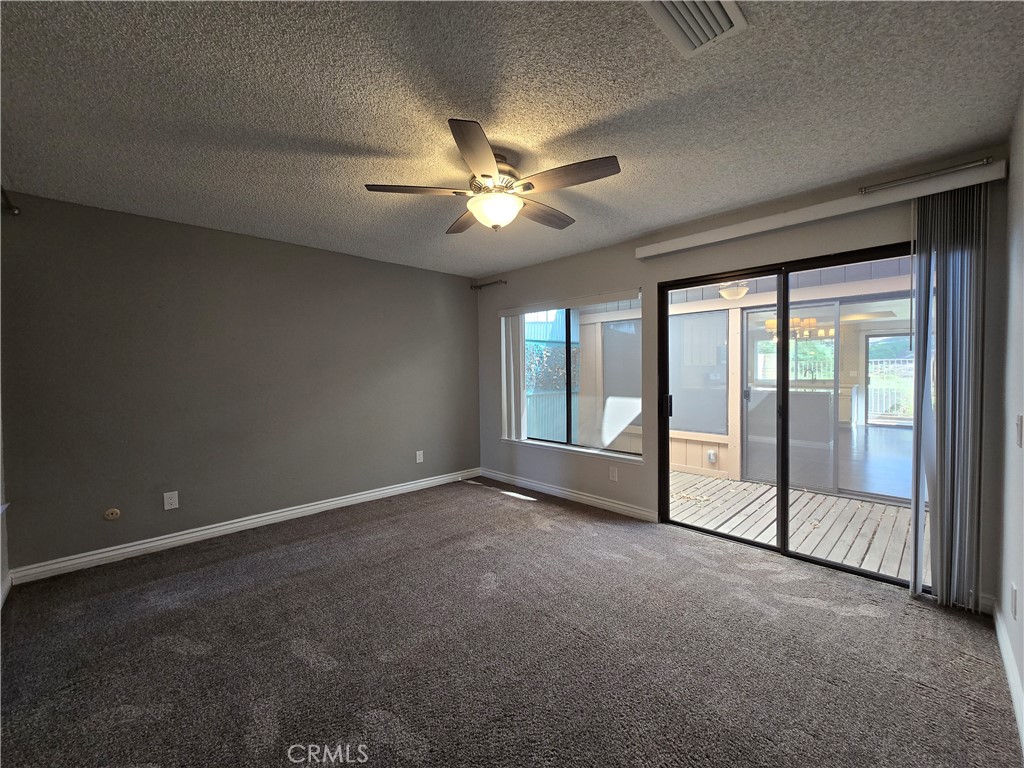 2595 Laramie Road Riverside, CA 92506 - Photo 16 of 29 wooden floor and windows in an empty room