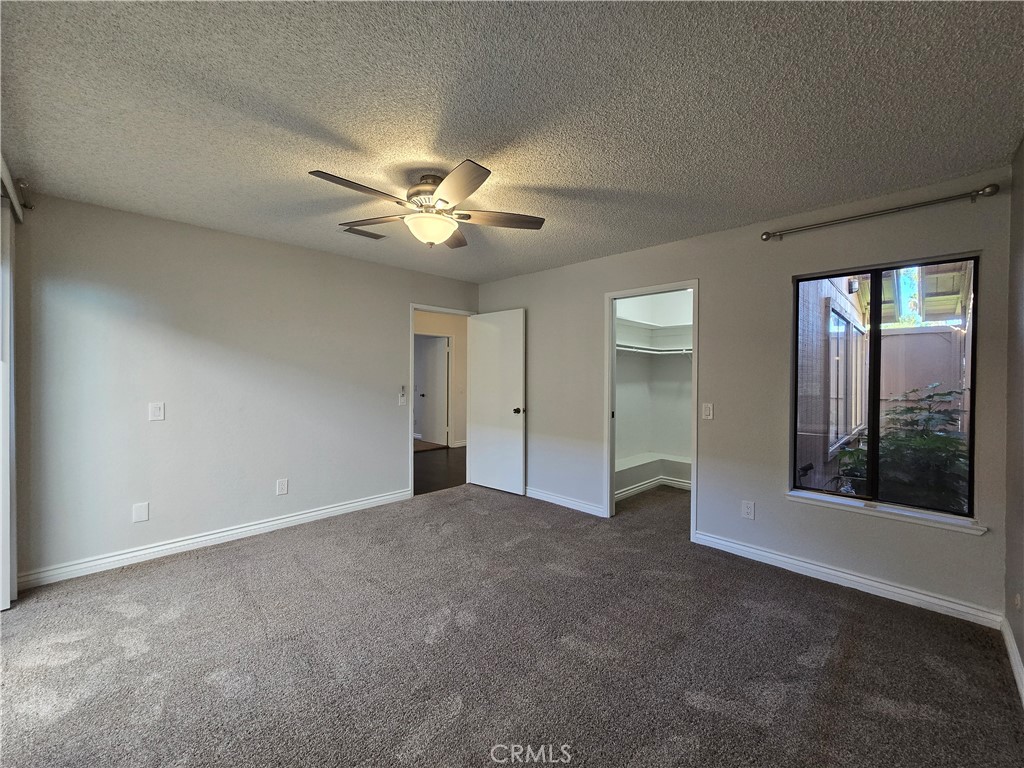 2595 Laramie Road Riverside, CA 92506 - Photo 17 of 29 wooden floor in an empty room with a window