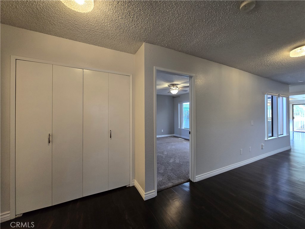 2595 Laramie Road Riverside, CA 92506 - Photo 19 of 29 an empty room with wooden floor