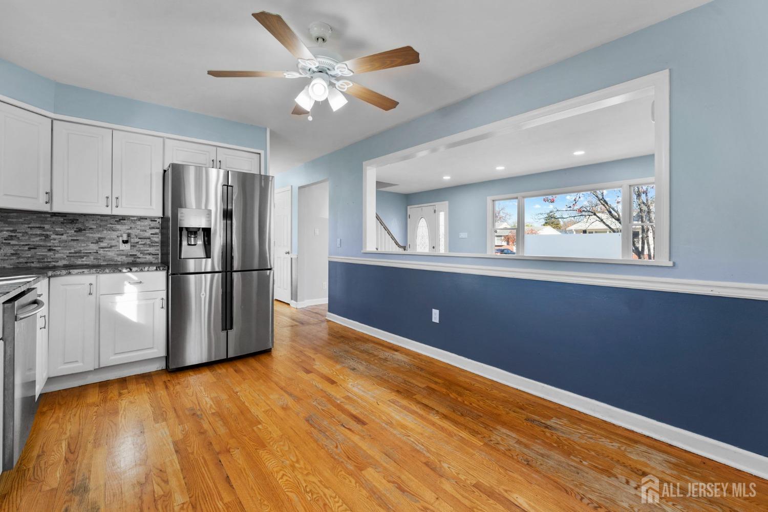 23 Alton Road Hamilton, NJ 08619 - Photo 34 of 40 a kitchen with stainless steel appliances granite countertop a refrigerator and a stove top oven