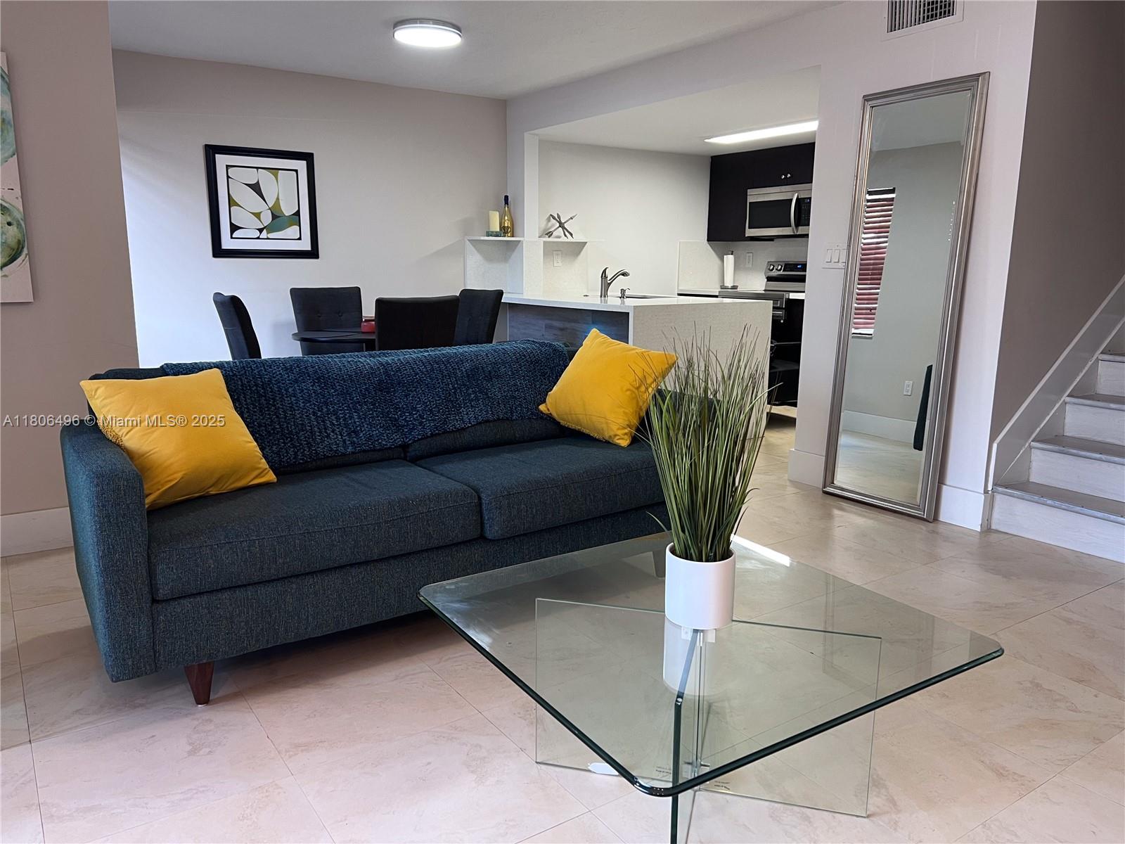 4530 Southwest 68th Ct Circle, Unit 316 Miami, FL 33155 - Photo 7 of 26 a living room with furniture