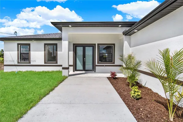 $345,000 | 916 Manresa Avenue South, Lehigh Acres, FL 33974